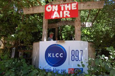 KLCC booth at the 2008 Oregon Country Fair. Music Director Michael Canning is shown in the booth.