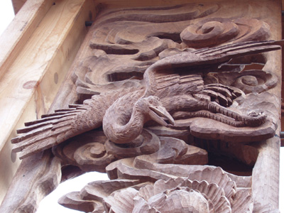 'Long Life' by Yoshiki Kawada, Shimada Mineo and students - Detail of crane Students in Lee Imonen's site-specific sculpture class worked with two master woodcarvers from Japan to create a large, two-sided mahogany relief panel titled, "Long Life."
