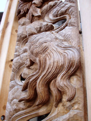 'Long Life' by Yoshiki Kawada, Shimada Mineo and students - Detail of carving Students in Lee Imonen's site-specific sculpture class worked with two master woodcarvers from Japan to create a large, two-sided mahogany relief panel titled, "Long Life."