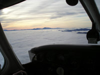 view outside window of plane while flying