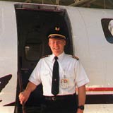 Man standing in front of a plane