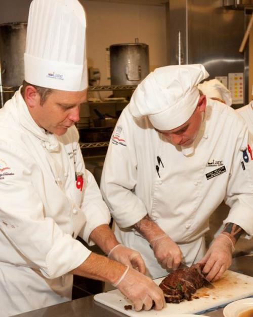 chef instructing student
