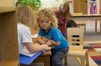 ECE Student engaged with child