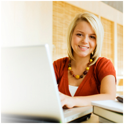 student sitting at computer