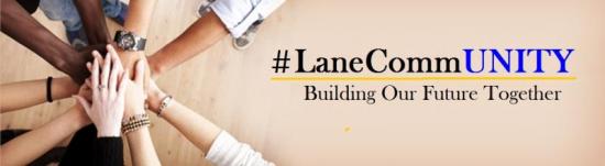 Multiple hands stacked together in unity with a hashtag lanecommunity - building our future together