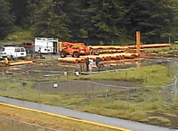 Longhouse first log during construction