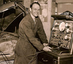 Bob Maxwell evaluates new engine testing machine at Central Oregon College, 1960