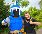 Ty the LCC Titan mascot with a happy student