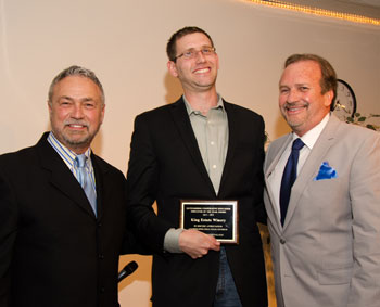 picturee of Al King, Benjamin Nadolny with award, and Joe McCully