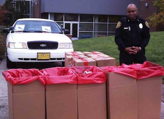 Public safety officer with car and collection containers