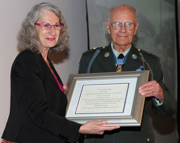 President Mary Spilde and veteran Robert Maxwell