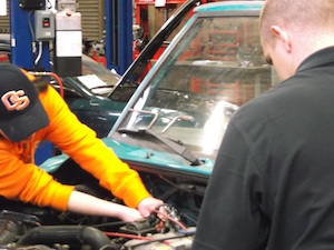 Students check out engine in Auto Tech