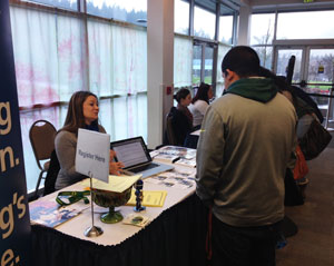 image of students at signup desk