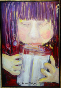 image of young girl drinking a glass of milk