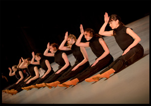 image of dancers on stage, in pose