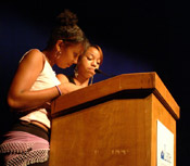 Students make a presentation at a Rites of Passage event. The program is in its 16th year