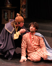 two costumed actors on stage