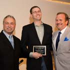 Al King, Benjamin Nadolny with award, and Joe McCully