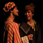 picture of two actors in dress rehearsal