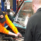 Students check out engine in Auto Tech