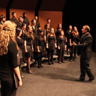 image of Matthew Svoboda conducting the Lane Chamber Choir