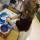 Happy young artist at Lane Child and Family Center