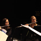 image of two ladies playing flutes