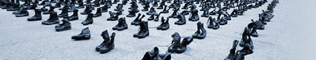 Large group of boots lined up in ranks