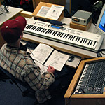 above student following along with the lesson in the music classroom