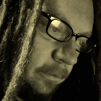 close up sepia tone image of Jaron Lanier