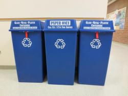Recycle beverage and food containers inside in the blue recycling containers next to every paper container in the corridors of every building on campus