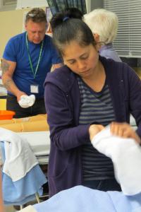 Personal care aide in training