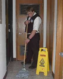 Student Worker cleaning the Full Access Brokerage
