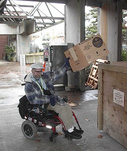 Student Worker recycling cardboard