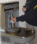 persong using bottle filling station